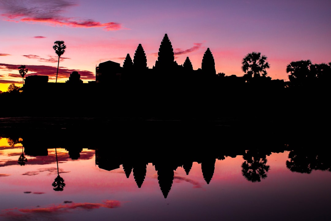 Angkor Wat temple silhouette at sunrise