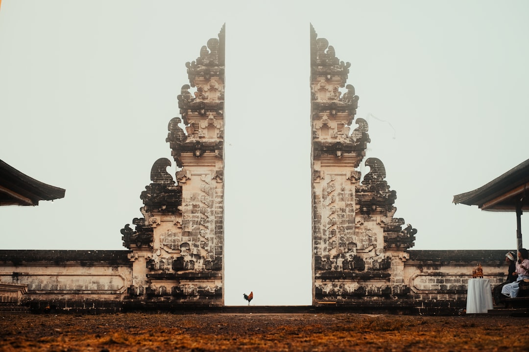 Traditional Balinese temple gate at sunrise