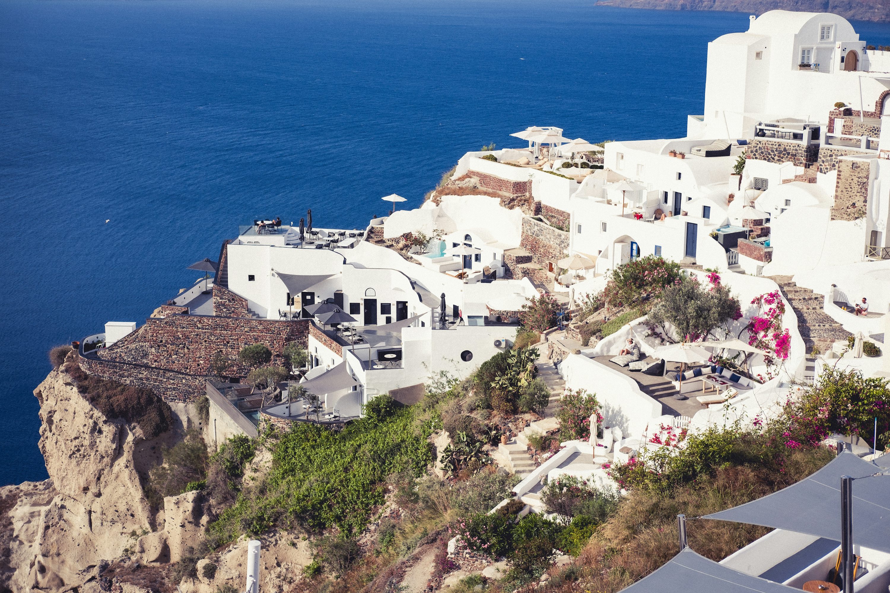 Santorini Greece white buildings and blue domes at sunset